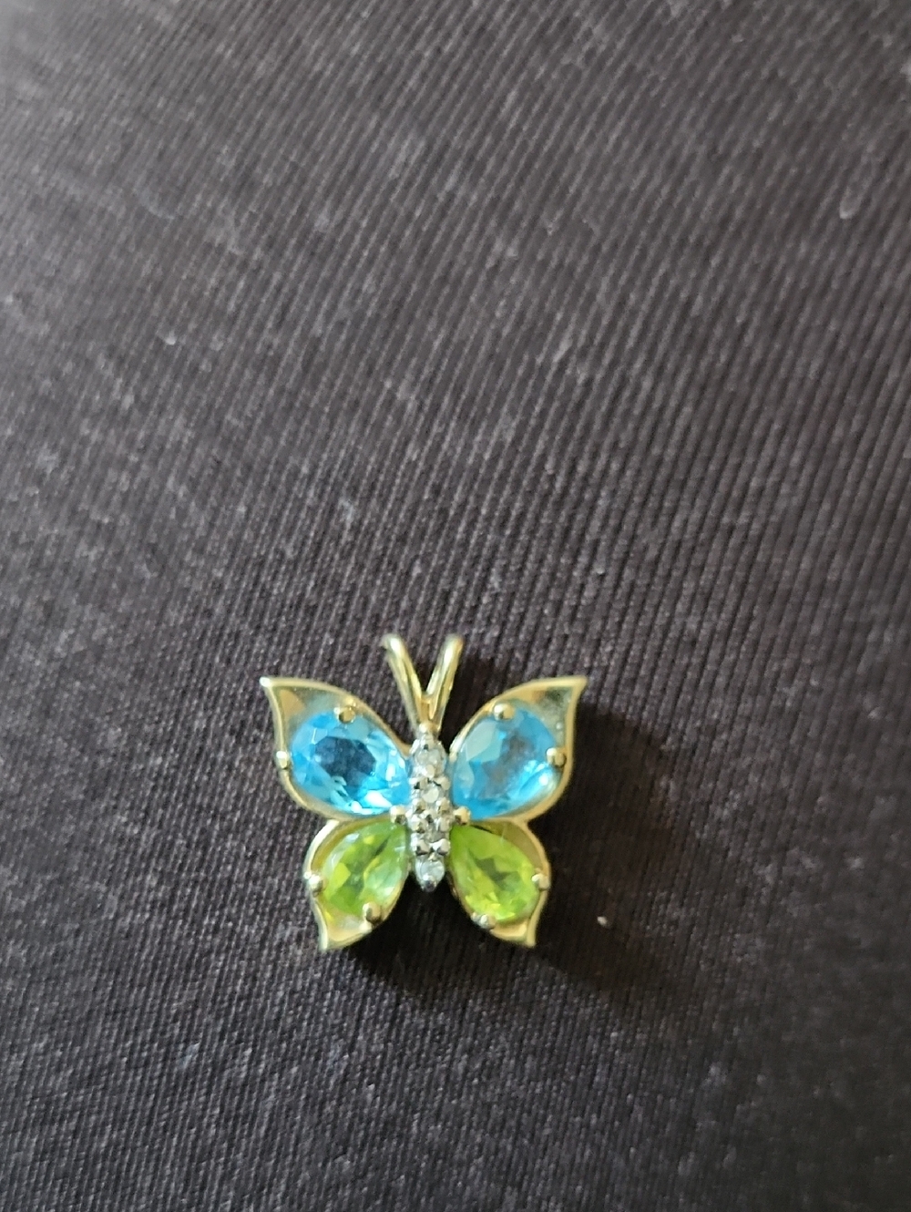 Gold Butterfly Pendant Necklace with diamonds, blue topaz and peridot stones